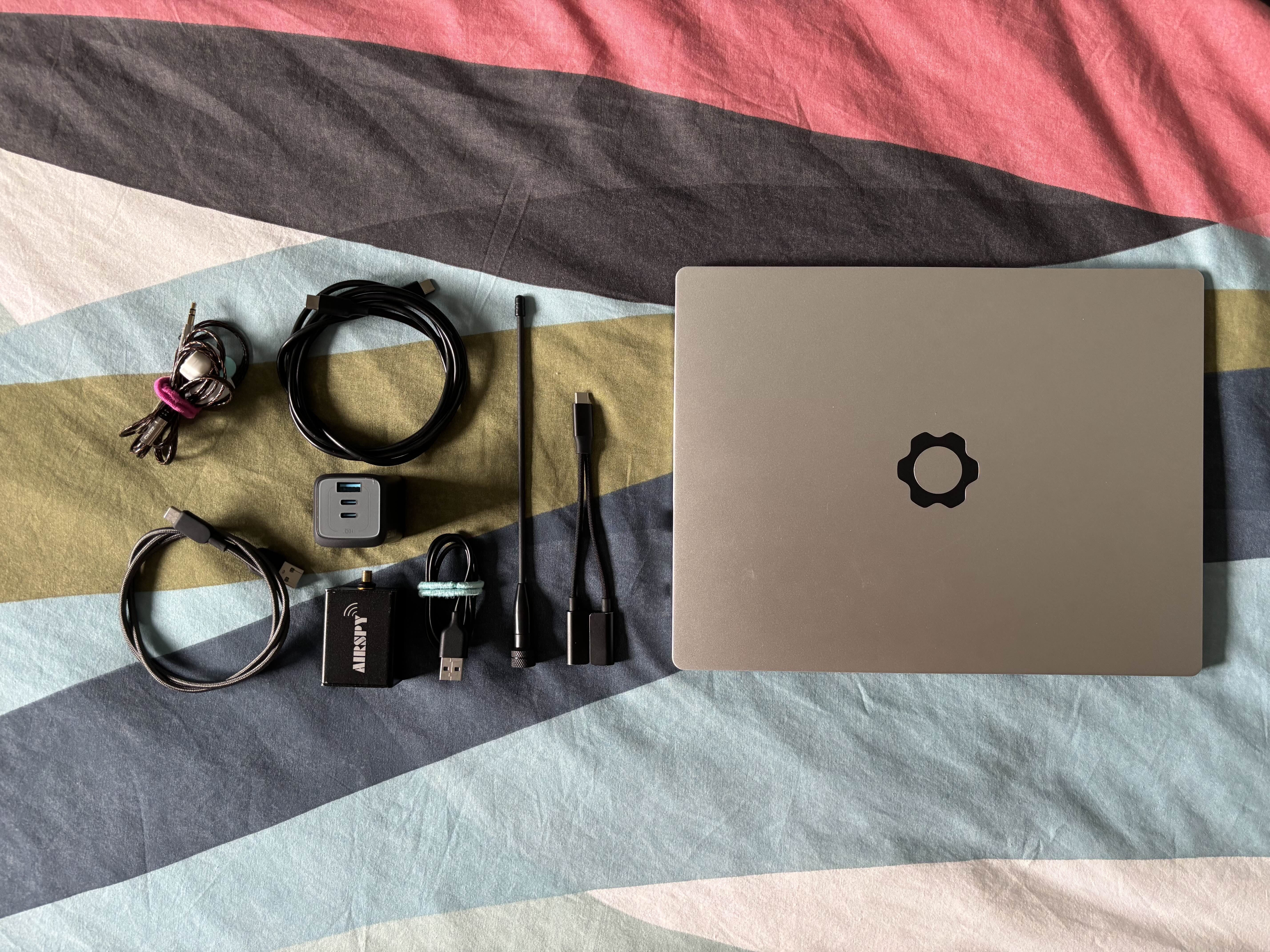 Photo of the contents of the tech related items in my backpack.