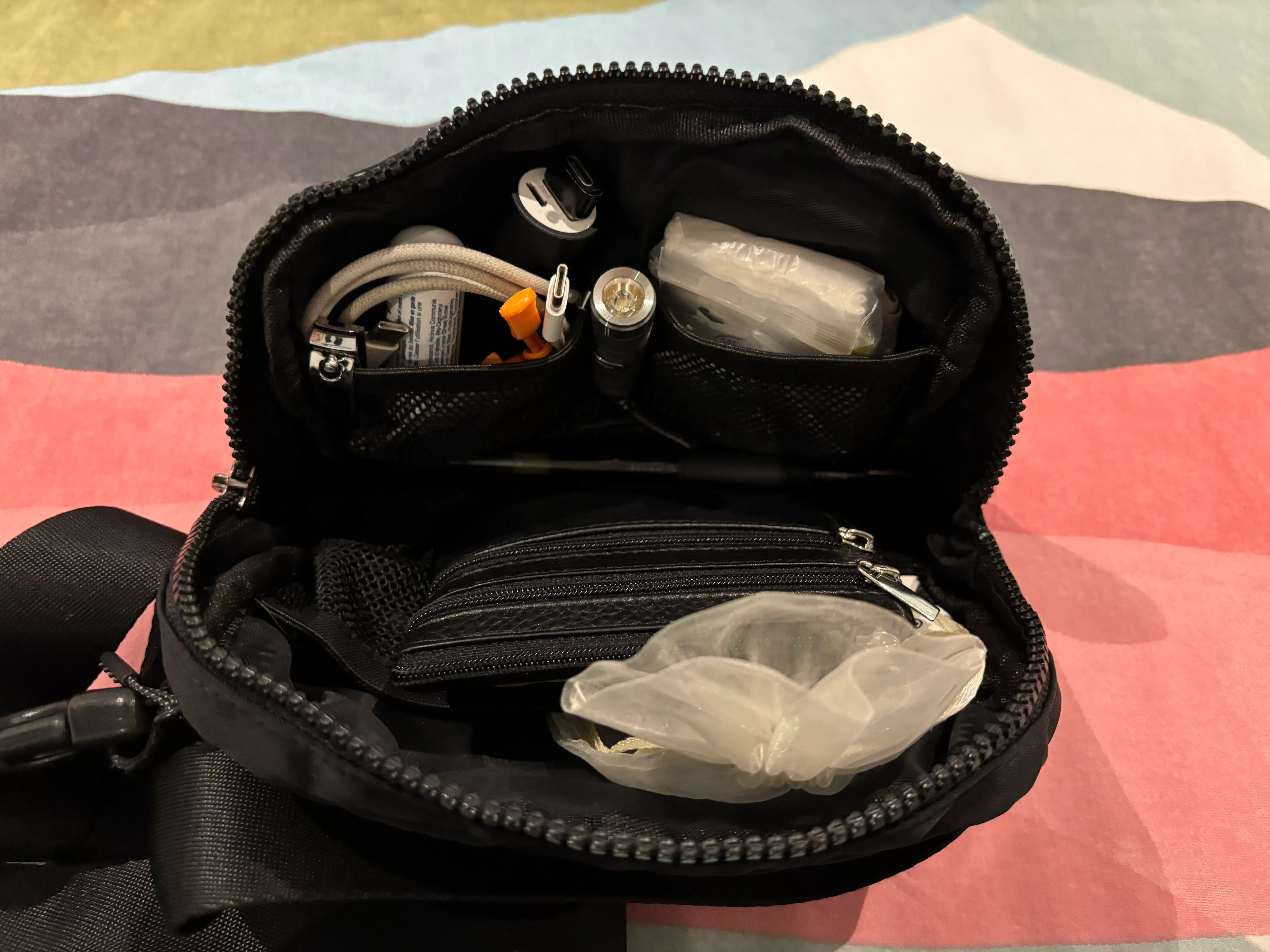 Photo of inside the main compartment of my purse with my daily carry filling the mesh organizers.